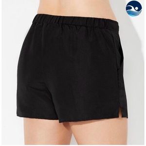 Size 18 polyester Aquabelle lined swim shorts with pockets and Velcro closure